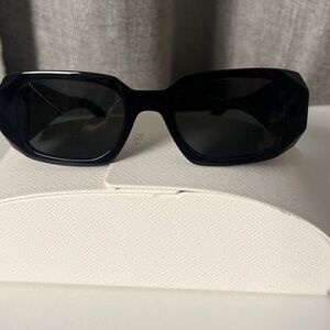 Prada Black Sunglasses with Elegant White Case